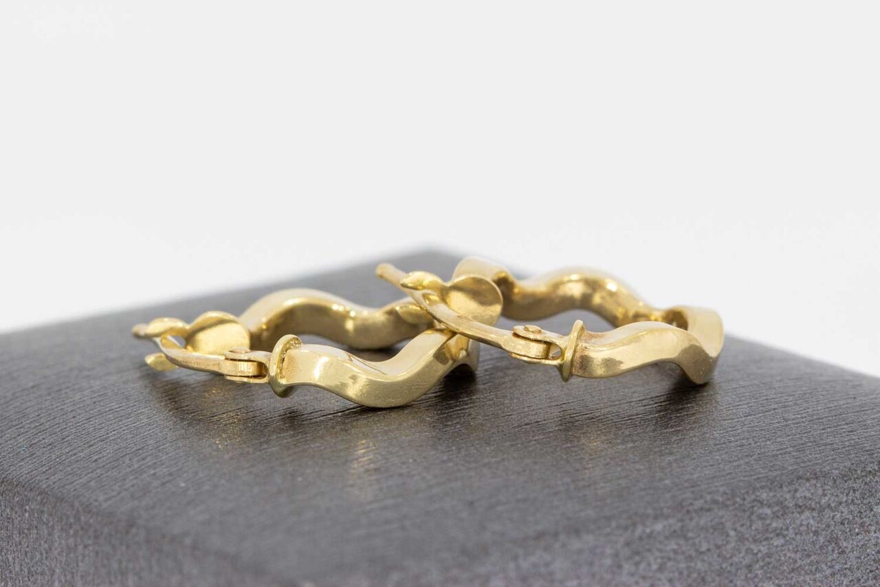 Wokkel oorbellen goud 14 Karaat - 1,4 mm