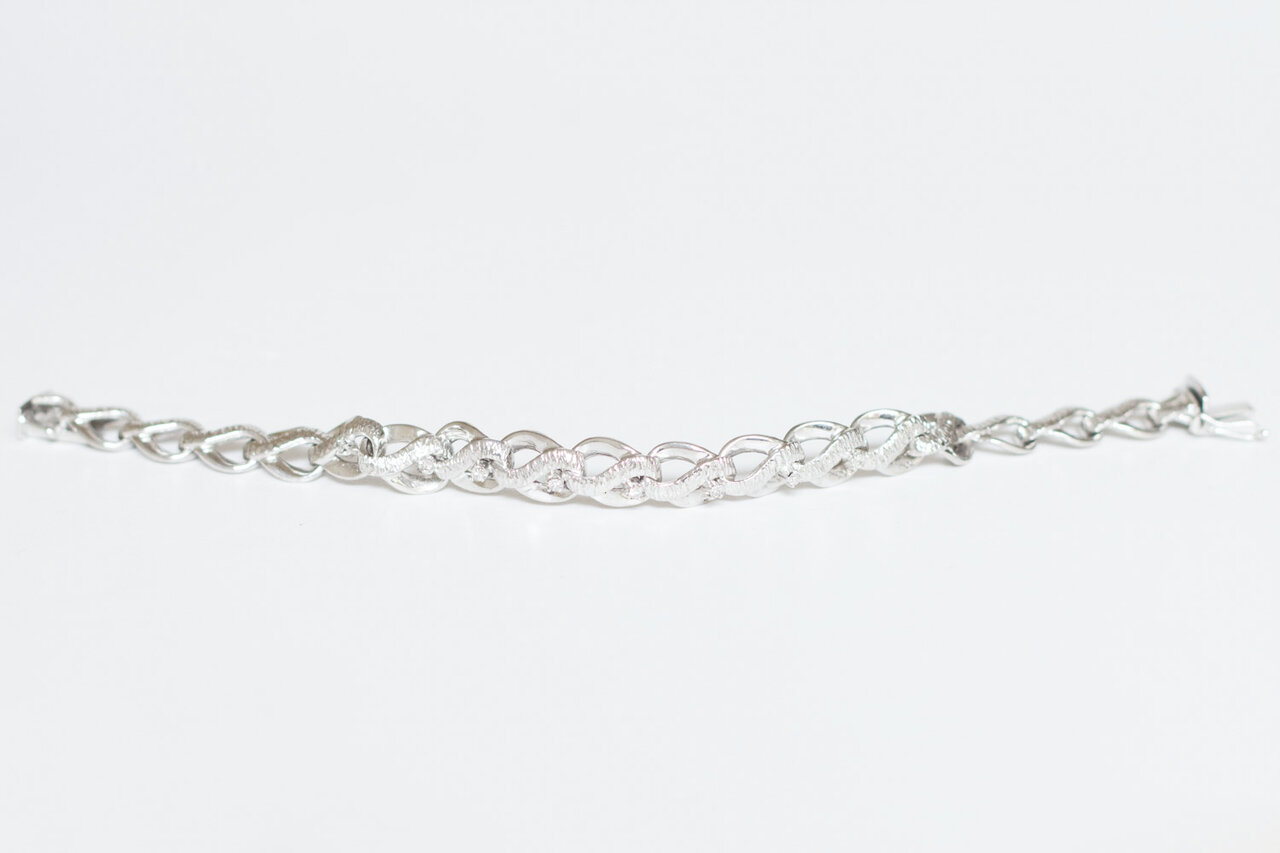 Witgouden gevlochten armband dames 18 karaat met diamant - 18,5 cm