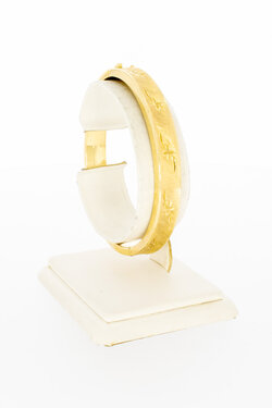 14 karaat bewerkte gouden slavenarmband dames