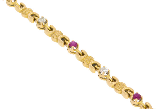 18 Karaat gouden armband gezet met Robijn & Saffier-18 cm