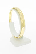 Brede 14 karaat gouden slaven armband