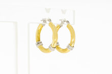 Bicolor oorringen 18 karaat goud - 2 cm