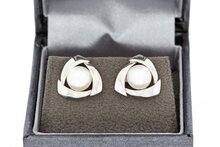 Parel oorknoppen 18 karaat goud - 1,2 cm