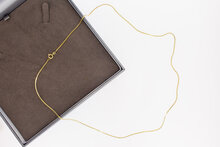 14 karaat gouden ketting met dubbel eindstuk  60,7 cm