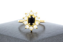 18 karaat geelgouden ring met blauwe saffier 17,7 mm