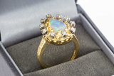 18 Karaat gouden ring gezet met Opaal en Saffier - 16,3