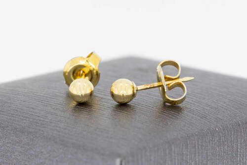 14 Karaat gouden bol oorknopjes - 0,4 cm
