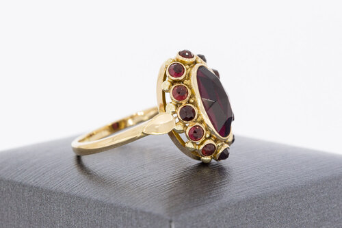 14 karaat geelgouden ring met granaat  18,6 mm